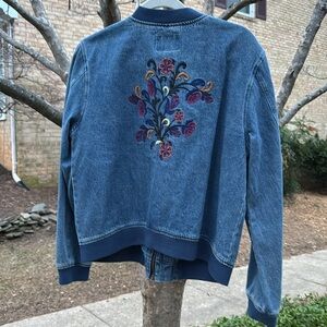 Velvet Heart zip up denim jacketed with embroidered floral design on back